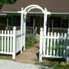 Arbor with picket fence